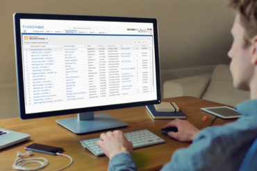 supported by experts, man on computer